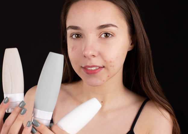 woman_holding_medicated_anti-fungal_shampoo_for_face_bottles