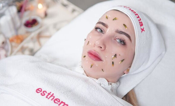 Young lady in dermatalogist office using natural remedies for fungal skin condition