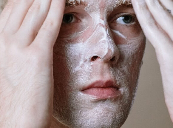 Is Benzoyl Peroxide Good for Fungal Acne - Young man with facial acne with treatment on face