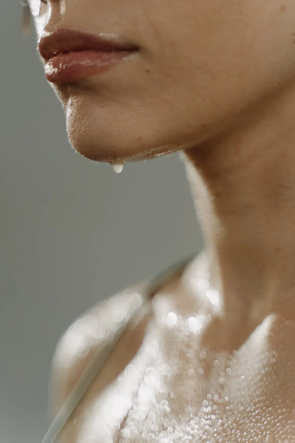 Woman - Chin Sweat Dripping Under Breast